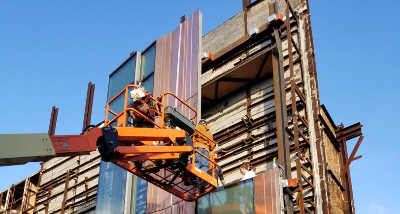 metal panels installation on building exterior