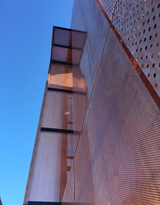 closeup detail of copper perforated panel systems